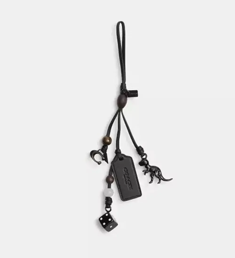 Original COACH T-Rex Rexy Signature Glass Wood tag Glovetaned Leather bag charm